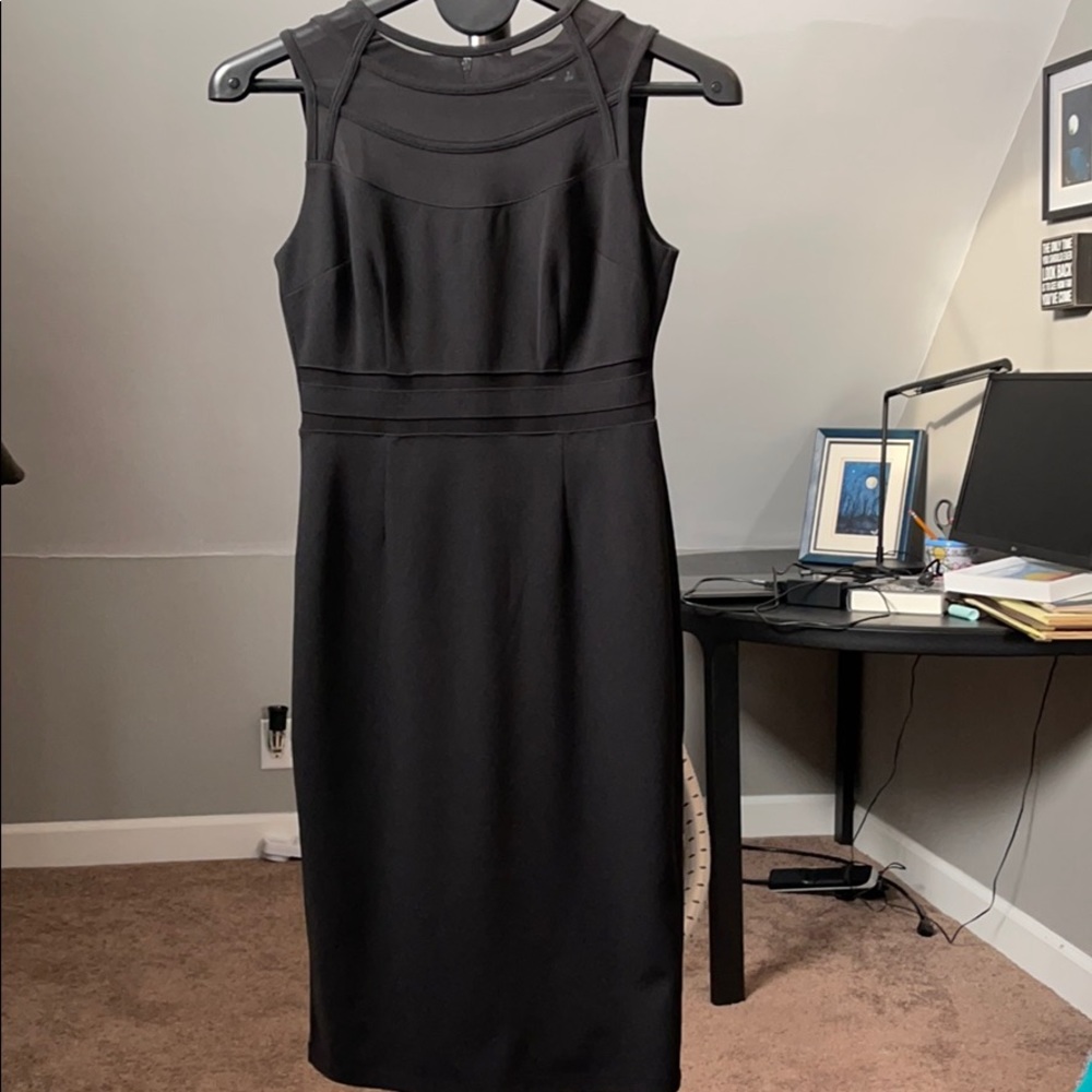 Sheath dress with mesh detail.